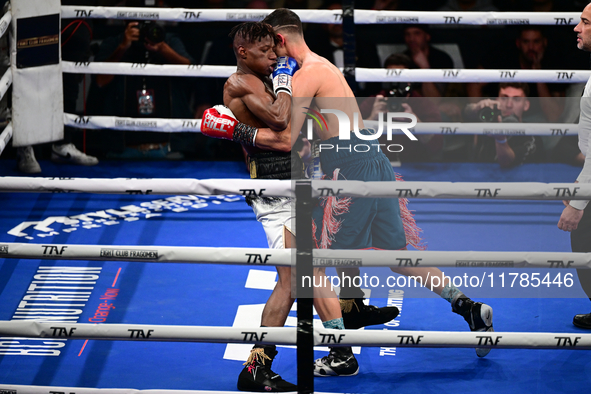 Francesco Paparo and Mohamed Diallo fight during the match for the Italian super featherweight title at TAF 7 at Allianz Cloud Milano in Mil...