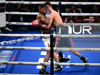 Francesco Paparo and Mohamed Diallo fight during the match for the Italian super featherweight title at TAF 7 at Allianz Cloud Milano in Mil...