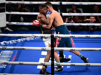 Francesco Paparo and Mohamed Diallo fight during the match for the Italian super featherweight title at TAF 7 at Allianz Cloud Milano in Mil...