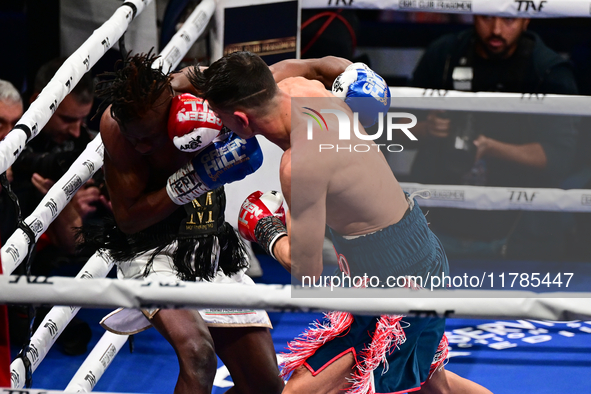 Francesco Paparo and Mohamed Diallo fight during the match for the Italian super featherweight title at TAF 7 at Allianz Cloud Milano in Mil...