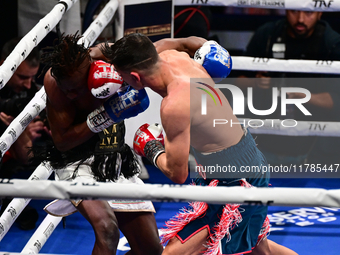 Francesco Paparo and Mohamed Diallo fight during the match for the Italian super featherweight title at TAF 7 at Allianz Cloud Milano in Mil...