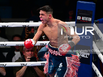 Francesco Paparo and Mohamed Diallo fight during the match for the Italian super featherweight title at TAF 7 at Allianz Cloud Milano in Mil...