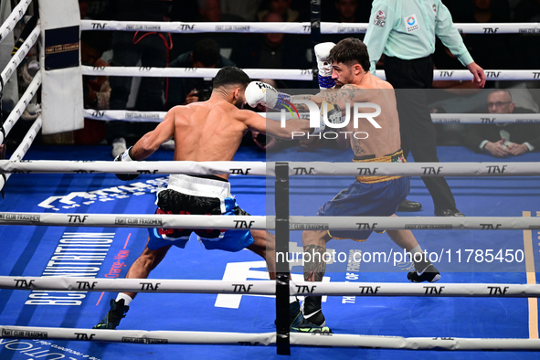 Jonathan Kogasso and Roberto Lizzi fight during the match for the Italian light heavyweight title at TAF 7 at Allianz Cloud Milano in Milan,...