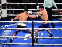 Jonathan Kogasso and Roberto Lizzi fight during the match for the Italian light heavyweight title at TAF 7 at Allianz Cloud Milano in Milan,...