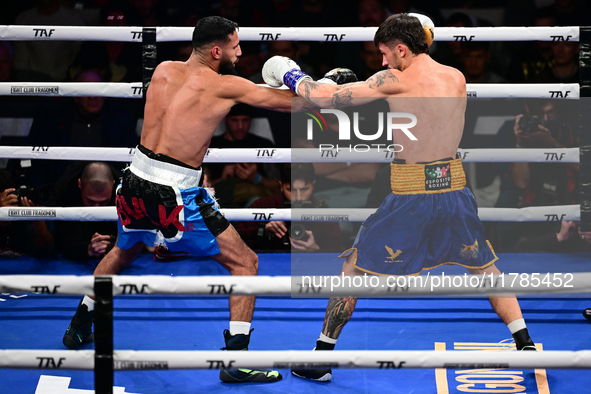 Jonathan Kogasso and Roberto Lizzi fight during the match for the Italian light heavyweight title at TAF 7 at Allianz Cloud Milano in Milan,...