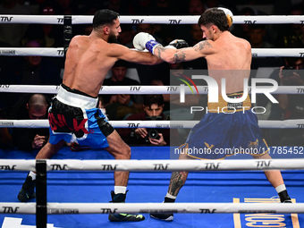 Jonathan Kogasso and Roberto Lizzi fight during the match for the Italian light heavyweight title at TAF 7 at Allianz Cloud Milano in Milan,...