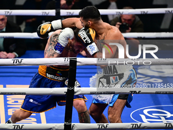 Jonathan Kogasso and Roberto Lizzi fight during the match for the Italian light heavyweight title at TAF 7 at Allianz Cloud Milano in Milan,...