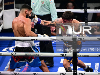 Jonathan Kogasso and Roberto Lizzi fight during the match for the Italian light heavyweight title at TAF 7 at Allianz Cloud Milano in Milan,...