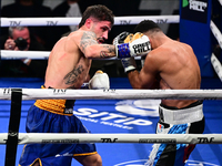 Jonathan Kogasso and Roberto Lizzi fight during the match for the Italian light heavyweight title at TAF 7 at Allianz Cloud Milano in Milan,...