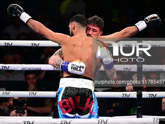 Jonathan Kogasso and Roberto Lizzi fight during the match for the Italian light heavyweight title at TAF 7 at Allianz Cloud Milano in Milan,...