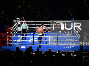 Jonathan Kogasso and Roberto Lizzi fight during the match for the Italian light heavyweight title at TAF 7 at Allianz Cloud Milano in Milan,...