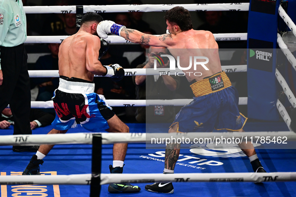 Jonathan Kogasso and Roberto Lizzi fight during the match for the Italian light heavyweight title at TAF 7 at Allianz Cloud Milano in Milan,...