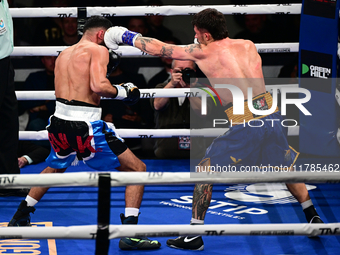 Jonathan Kogasso and Roberto Lizzi fight during the match for the Italian light heavyweight title at TAF 7 at Allianz Cloud Milano in Milan,...