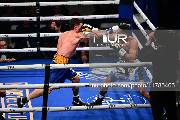 Jonathan Kogasso and Roberto Lizzi fight during the match for the Italian light heavyweight title at TAF 7 at Allianz Cloud Milano in Milan,...