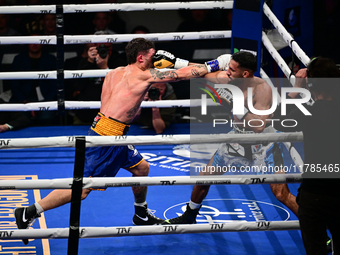 Jonathan Kogasso and Roberto Lizzi fight during the match for the Italian light heavyweight title at TAF 7 at Allianz Cloud Milano in Milan,...