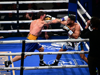 Jonathan Kogasso and Roberto Lizzi fight during the match for the Italian light heavyweight title at TAF 7 at Allianz Cloud Milano in Milan,...