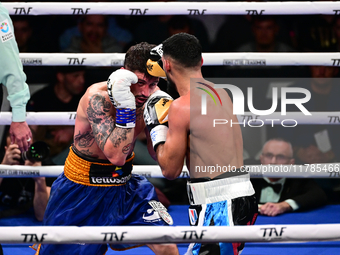 Jonathan Kogasso and Roberto Lizzi fight during the match for the Italian light heavyweight title at TAF 7 at Allianz Cloud Milano in Milan,...