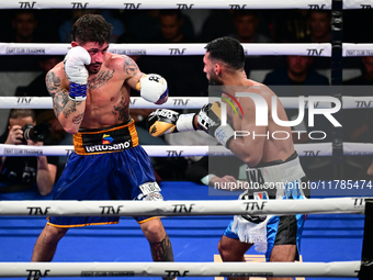 Jonathan Kogasso and Roberto Lizzi fight during the match for the Italian light heavyweight title at TAF 7 at Allianz Cloud Milano in Milan,...