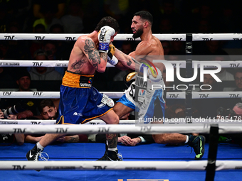 Jonathan Kogasso and Roberto Lizzi fight during the match for the Italian light heavyweight title at TAF 7 at Allianz Cloud Milano in Milan,...