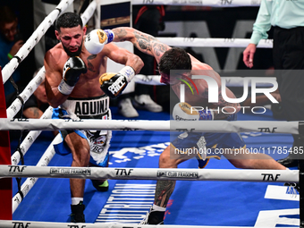 Jonathan Kogasso and Roberto Lizzi fight during the match for the Italian light heavyweight title at TAF 7 at Allianz Cloud Milano in Milan,...