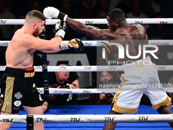 Jonathan Kogasso and Roberto Lizzi fight during the match for the Italian light heavyweight title at TAF 7 at Allianz Cloud Milano in Milan,...