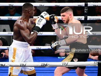 Jonathan Kogasso and Roberto Lizzi fight during the match for the Italian light heavyweight title at TAF 7 at Allianz Cloud Milano in Milan,...