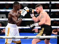 Jonathan Kogasso and Roberto Lizzi fight during the match for the Italian light heavyweight title at TAF 7 at Allianz Cloud Milano in Milan,...