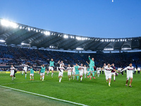 Players of Bologna FC celebrate victory at the end of the Serie A Enilive match between AS Roma and Bologna FC at Stadio Olimpico on Novembe...