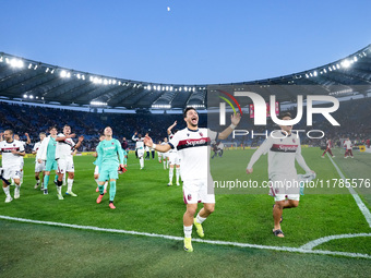 Riccardo Orsolini of Bologna FC celebrates the victory at the end of the Serie A Enilive match between AS Roma and Bologna FC at Stadio Olim...