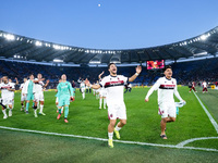 Riccardo Orsolini of Bologna FC celebrates the victory at the end of the Serie A Enilive match between AS Roma and Bologna FC at Stadio Olim...