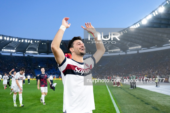 Riccardo Orsolini of Bologna FC celebrates the victory at the end of the Serie A Enilive match between AS Roma and Bologna FC at Stadio Olim...