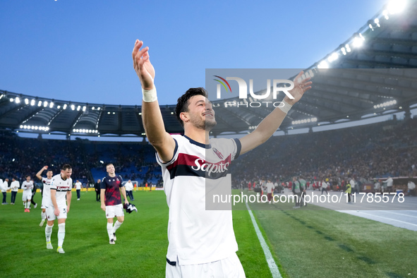 Riccardo Orsolini of Bologna FC celebrates the victory at the end of the Serie A Enilive match between AS Roma and Bologna FC at Stadio Olim...