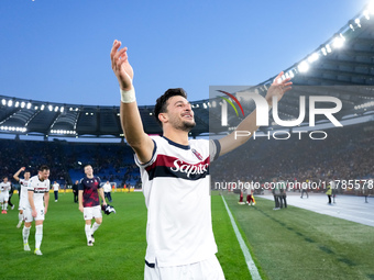 Riccardo Orsolini of Bologna FC celebrates the victory at the end of the Serie A Enilive match between AS Roma and Bologna FC at Stadio Olim...