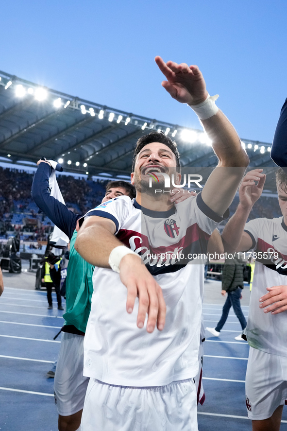 Riccardo Orsolini of Bologna FC celebrates the victory at the end of the Serie A Enilive match between AS Roma and Bologna FC at Stadio Olim...