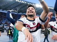 Riccardo Orsolini of Bologna FC celebrates the victory at the end of the Serie A Enilive match between AS Roma and Bologna FC at Stadio Olim...