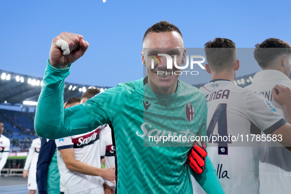 Lukasz Skorupski of Bologna FC celebrates the victory at the end of the Serie A Enilive match between AS Roma and Bologna FC at Stadio Olimp...