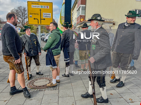 A Remembrance Day parade takes place in Gauting, Germany, on November 17, 2024. Members of local traditional associations, dressed in formal...