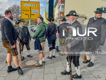 A Remembrance Day parade takes place in Gauting, Germany, on November 17, 2024. Members of local traditional associations, dressed in formal...