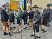 A Remembrance Day parade takes place in Gauting, Germany, on November 17, 2024. Members of local traditional associations, dressed in formal...