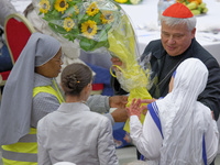 Cardinal Konrad Krajewski talks with a group of nuns before the lunch with the Pope and the poor on the occasion of the VII World Day of the...