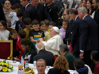 Pope Francis attends a lunch organized on the World Day of the Poor at the Paul VI audience hall in The Vatican, on November 17, 2024. (