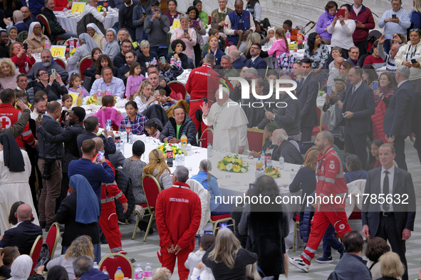 Pope Francis attends a lunch organized on the World Day of the Poor at the Paul VI audience hall in The Vatican, on November 17, 2024. 