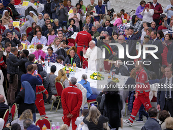 Pope Francis attends a lunch organized on the World Day of the Poor at the Paul VI audience hall in The Vatican, on November 17, 2024. (