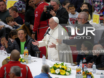 Pope Francis attends a lunch organized on the World Day of the Poor at the Paul VI audience hall in The Vatican, on November 17, 2024. (