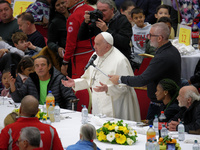 Pope Francis attends a lunch organized on the World Day of the Poor at the Paul VI audience hall in The Vatican, on November 17, 2024. (