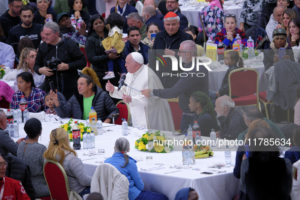 Pope Francis attends a lunch organized on the World Day of the Poor at the Paul VI audience hall in The Vatican, on November 17, 2024. 