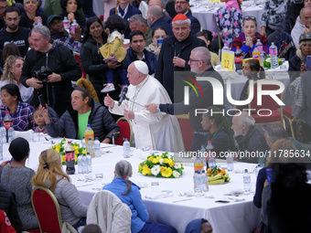 Pope Francis attends a lunch organized on the World Day of the Poor at the Paul VI audience hall in The Vatican, on November 17, 2024. (