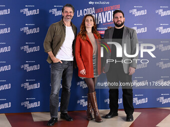 Luca Argentero, Cristiana dell'Anna, and Domenico De Feudis attend the photocall for ''La Coda del Diavolo'' at Cinema Barberini in Rome, It...