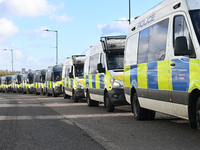 A row of police vehicles is outside Wembley prior to the UEFA Nations League 2024/5, League B, Group B2 match between England and the Republ...