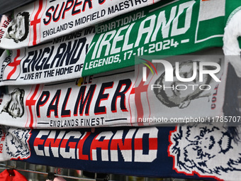 Scarves are at a merchandise stall before the UEFA Nations League 2024/5, League B, Group B2 match between England and the Republic of Irela...